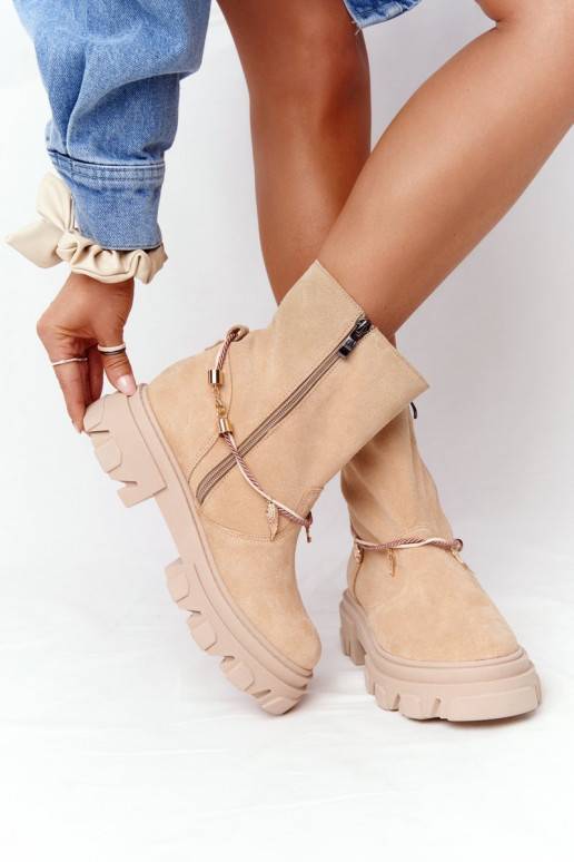 Massive beige Wildlederstiefel Massive beige Wildlederstiefel