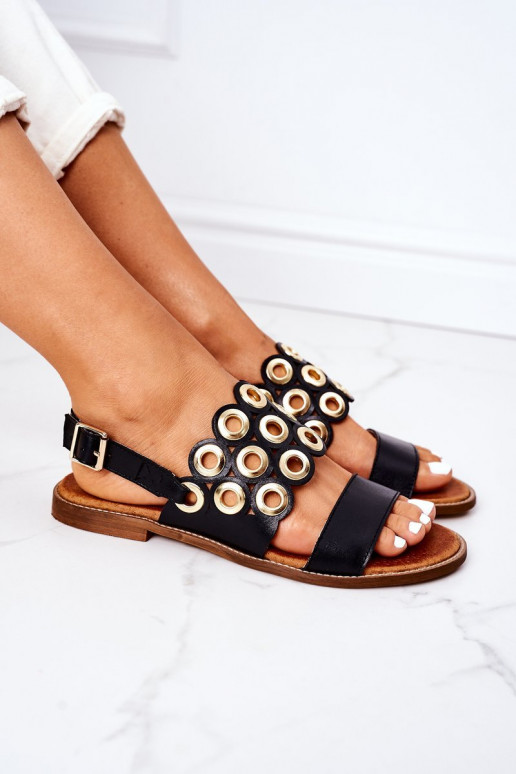 Schwarze, durchbrochene Sandalen. Schuhe für Damen