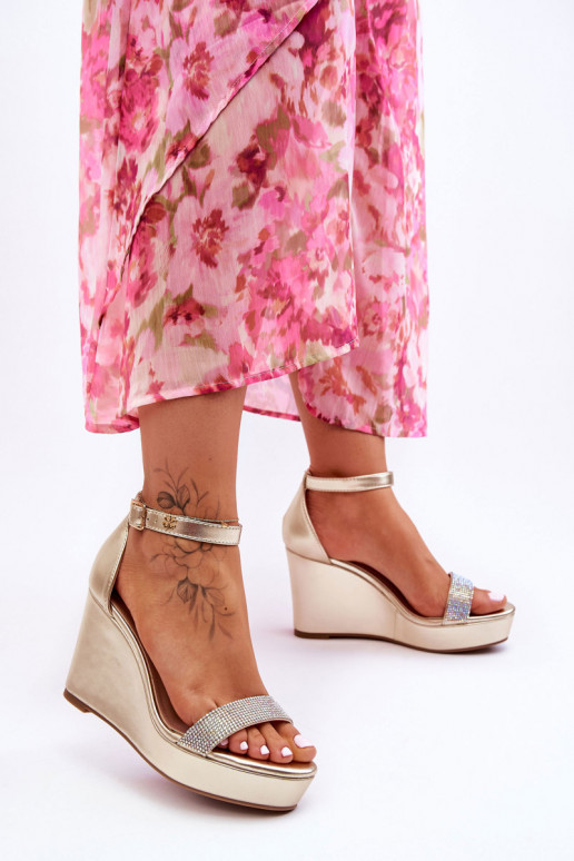 Goldfarbene Sandalen Arwen mit Plateau Goldfarbene Sandalen Arwen mit Plateau