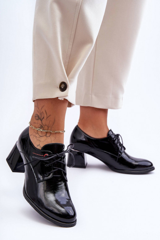 Lackierte Stiefeletten mit Absatz in... Lackierte Stiefeletten mit Absatz in...