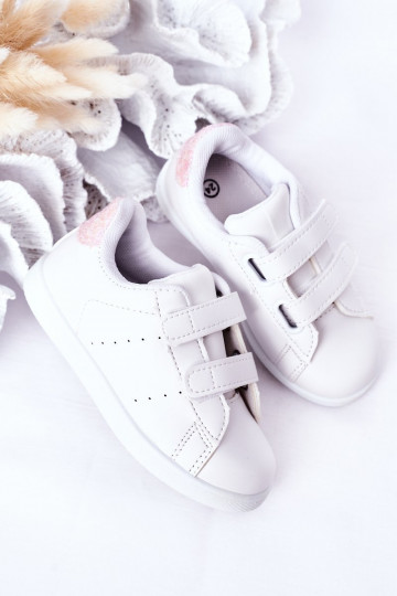 Kinder-Sneaker mit Klebeverschlüssen, weiß-rosa Farbe, süßes Mädchen