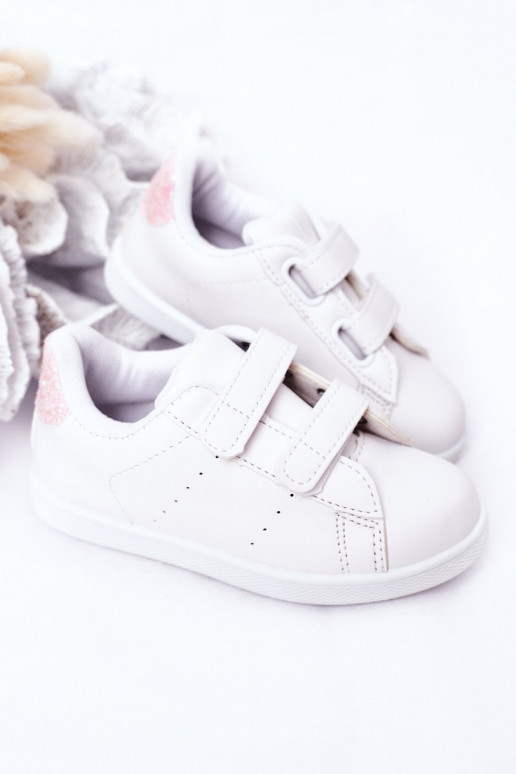 Kinder-Sneaker mit Klebeverschlüssen, weiß-rosa Farbe, süßes Mädchen Kinder-Sneaker mit Klebeverschlüssen, weiß-rosa Farbe, süßes Mädchen