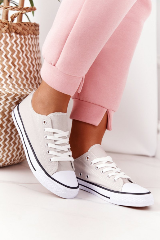 Freizeitschuhe des klassischen Modells in grauer Farbe Freizeitschuhe des klassischen Modells in grauer Farbe