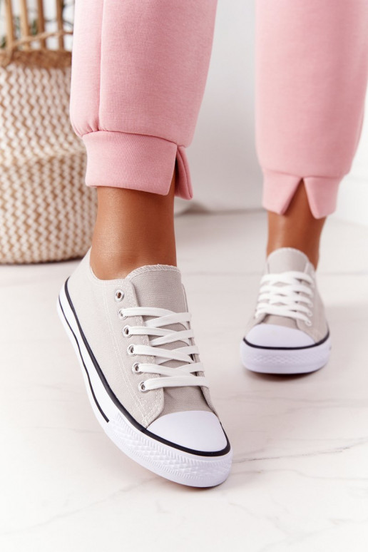 Freizeitschuhe des klassischen Modells in grauer Farbe Freizeitschuhe des klassischen Modells in grauer Farbe