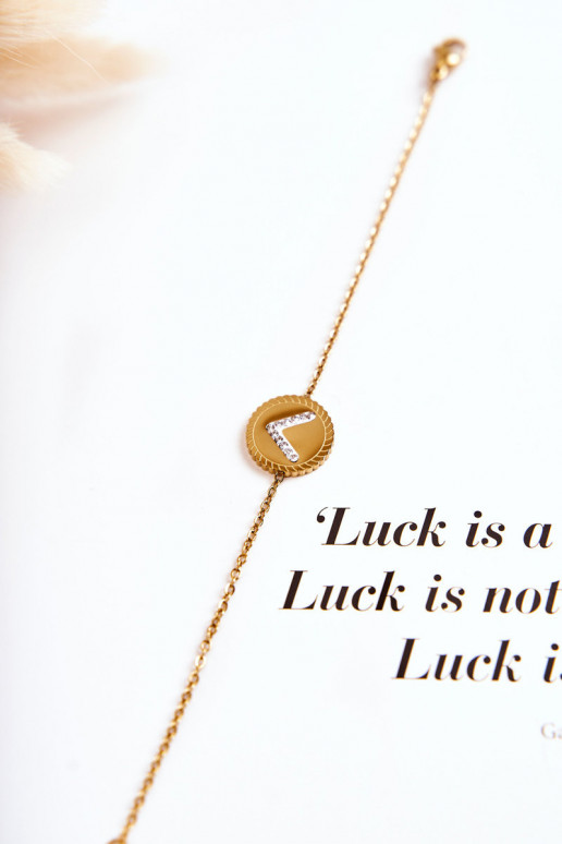 Damenarmband mit Ornamenten und Zirkonaugen in Goldfarbe Damenarmband mit Ornamenten und Zirkonaugen in Goldfarbe