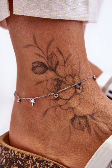 Silbernes Beinarmband mit funkelnden Augen