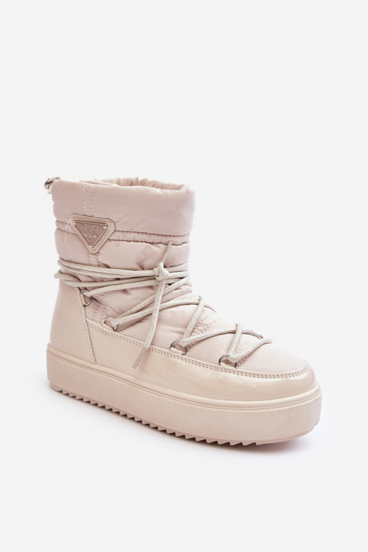 Schneestiefel mit Plateau und stylischen Details in Beige Fleure Schneestiefel mit Plateau und stylischen Details in Beige Fleure