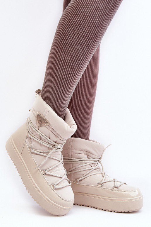 Schneestiefel mit Plateau und stylischen Details in Beige Fleure Schneestiefel mit Plateau und stylischen Details in Beige Fleure
