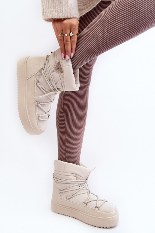 Schneestiefel mit Plateau und stylischen Details in Beige Fleure Schneestiefel mit Plateau und stylischen Details in Beige Fleure