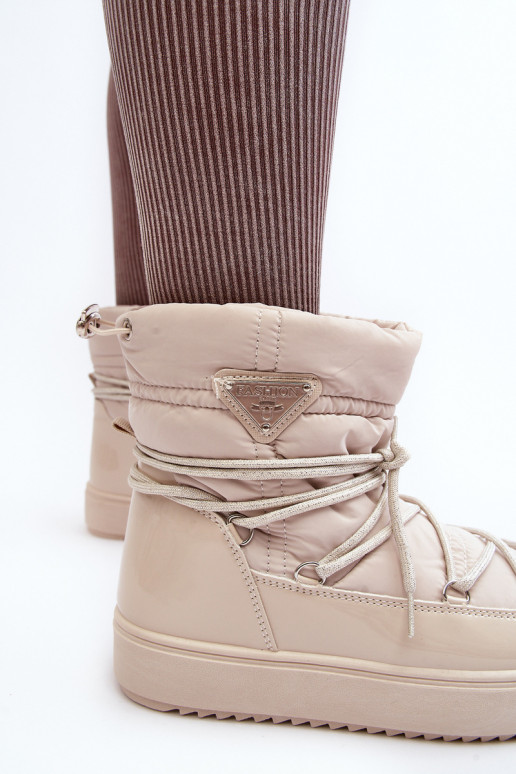 Schneestiefel mit Plateau und stylischen Details in Beige Fleure Schneestiefel mit Plateau und stylischen Details in Beige Fleure