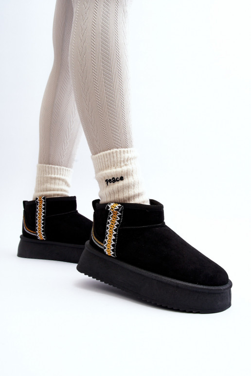 Gemusterte Plateau-Schneestiefel aus schwarzem Udra Gemusterte Plateau-Schneestiefel aus schwarzem Udra