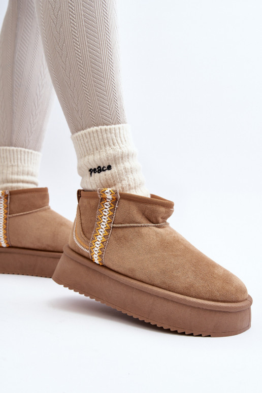 Gemusterte Plateau-Schneestiefel in braunem Udra Gemusterte Plateau-Schneestiefel in braunem Udra