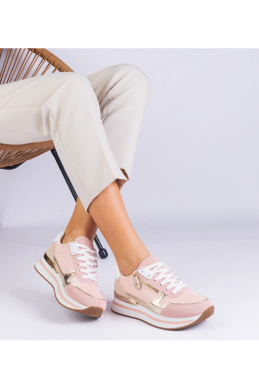 Rosa Sport-Sneaker auf Plateau mit...