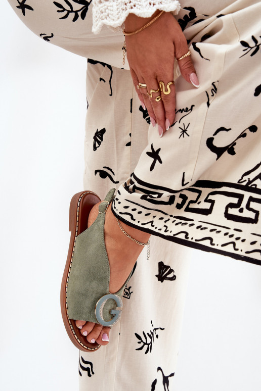 Flache Sandalen mit Ornamenten grüne Farbe Haliones Flache Sandalen mit Ornamenten grüne Farbe Haliones