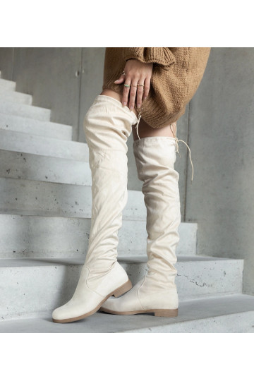 Beige lange Stiefel auf... 2