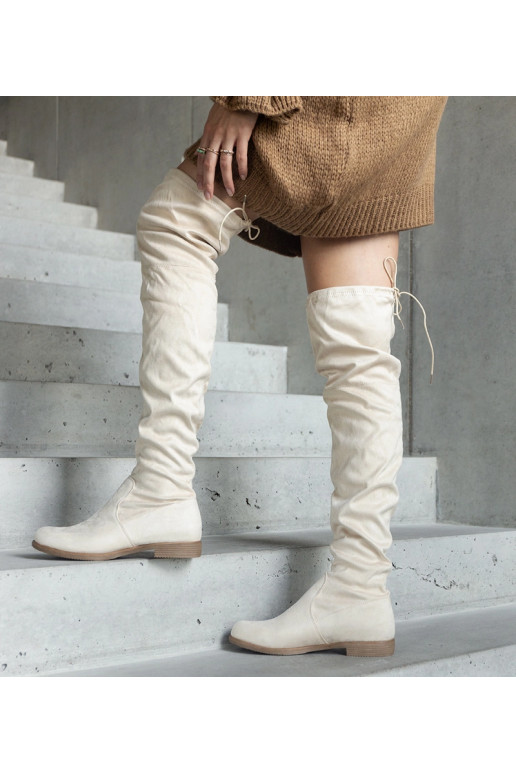 Beige lange Stiefel auf Plateau aus... Beige lange Stiefel auf Plateau aus...